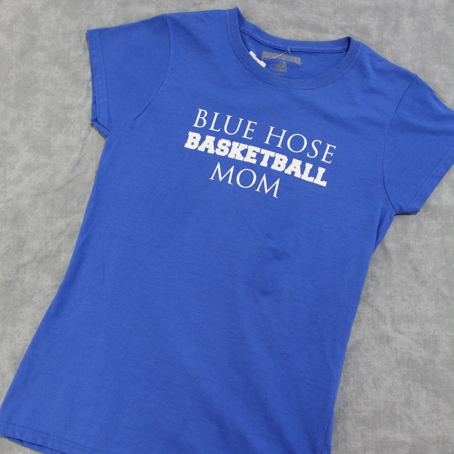 Royal blue ladies cut t-shirt with "Blue Hose Basketball Mom" screen printed in white on the front.