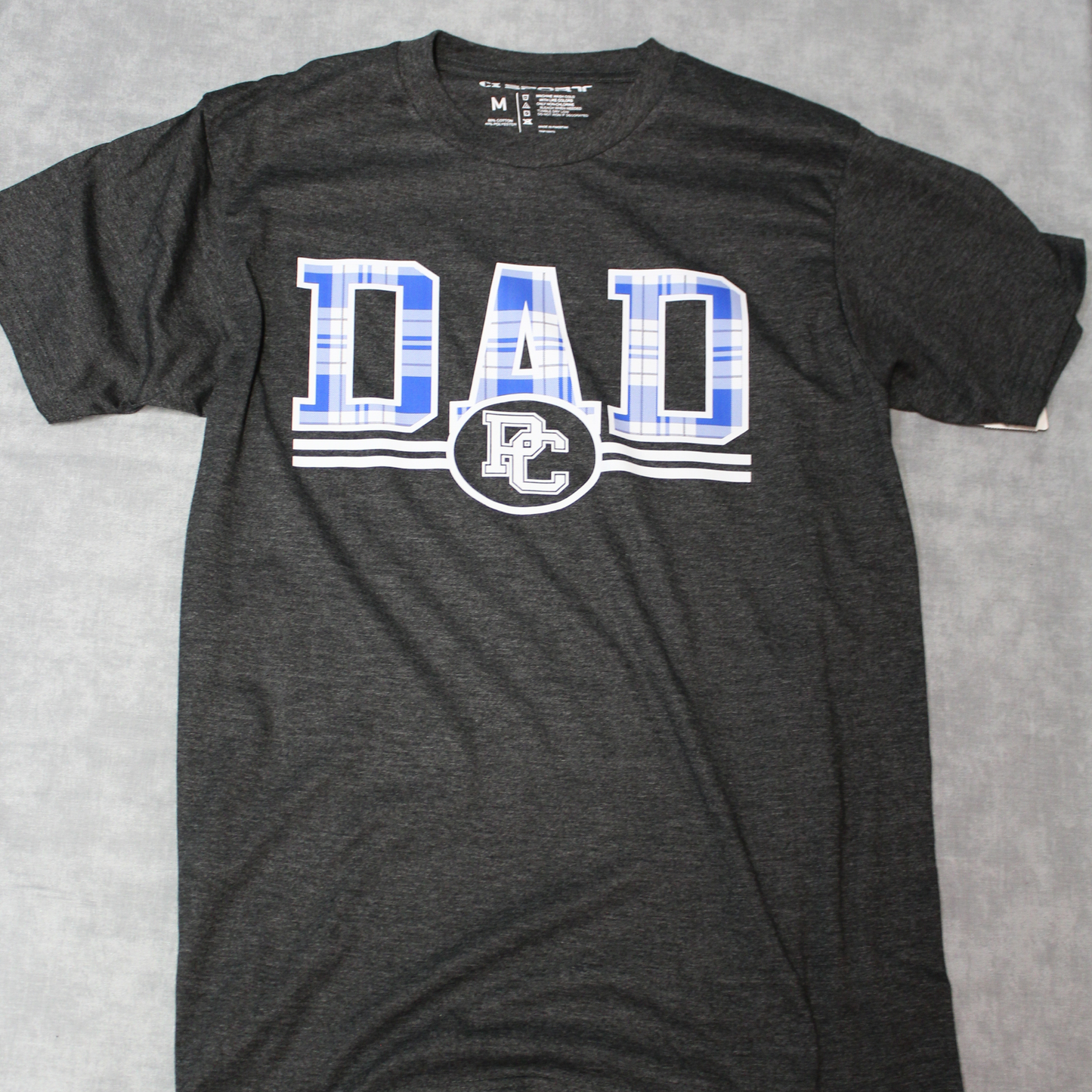 Charcoal grey heather tee shirt with royal and white screen print tartan Dad t-shirt with PC logo.