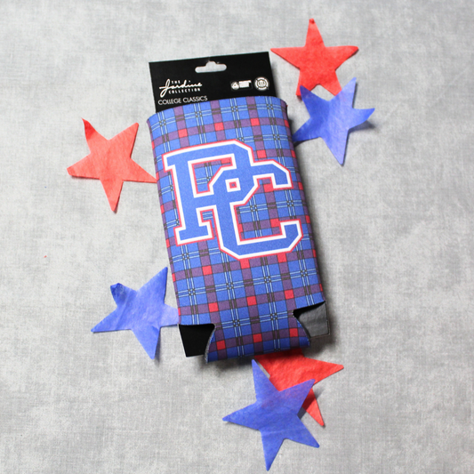 This photo features a tall slim can holder that is red and blue tartan with the 4 color (red, white, blue, and grey) block PC logo on the front. The background of this product photo has red, white, and blue stars.