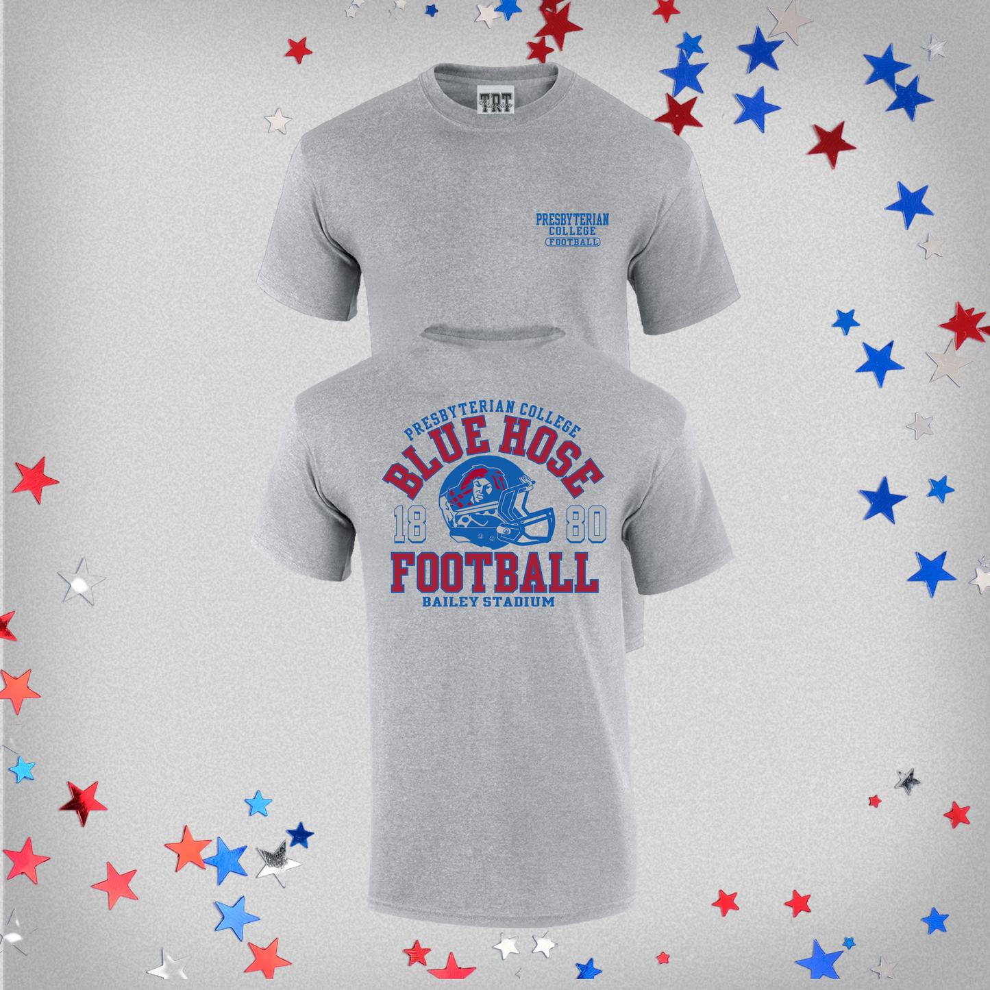 Product photo of the back of a light grey t-shirt that features a red and blue screen print of a football helmet with scotty the scotsman on it, along with the words Presbyterian College Blue Hose 1880 Football Bailey Stadium on it. The background of the product photo has red, white, and blue stars on it