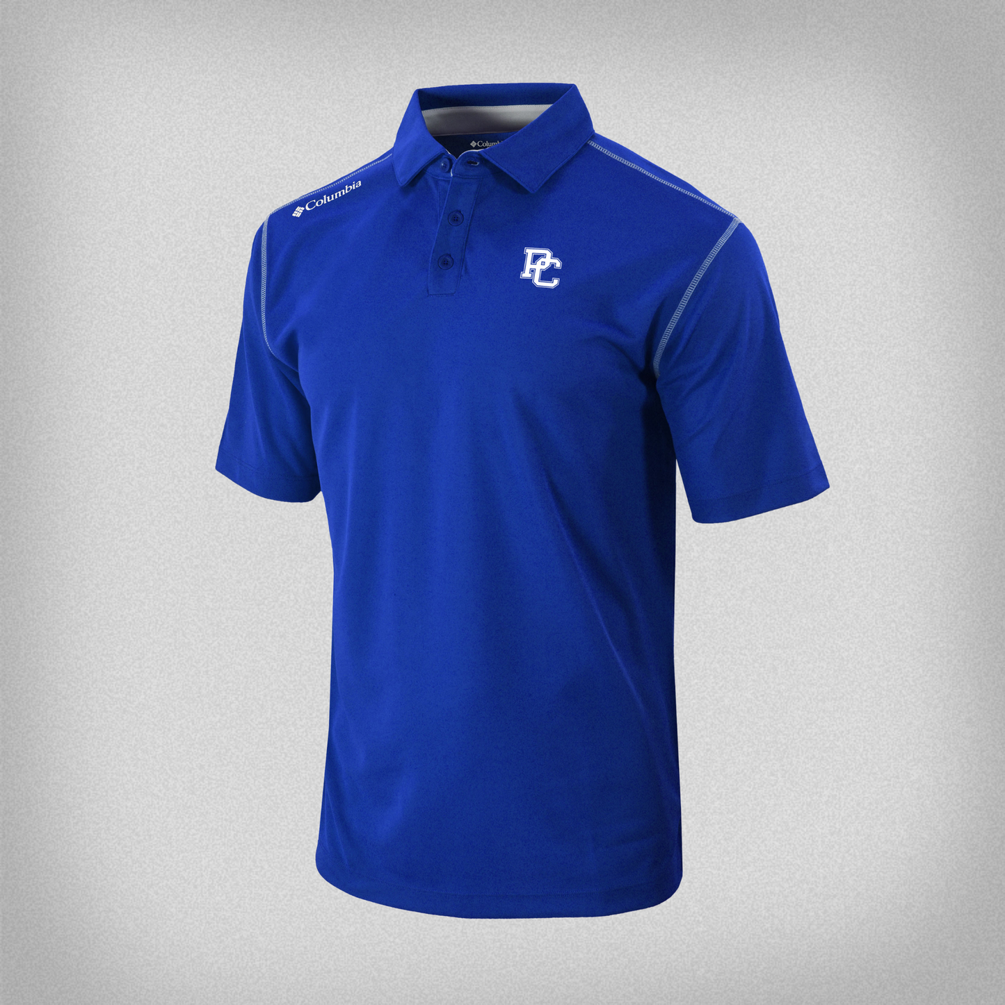 Product photo of a royal blue Columbia Polo that has white thread seams and an embroidered white block PC logo on the front left chest.