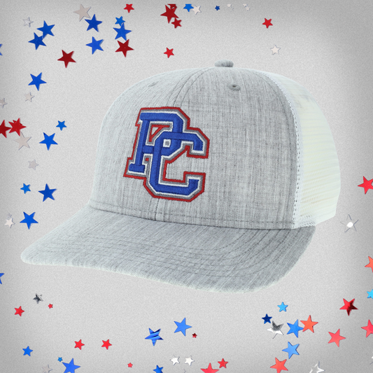 Light grey trucker hat with white mesh on the back. This hat features a 4 color block PC logo embroidered on the front. Background is red, white, and blue stars.