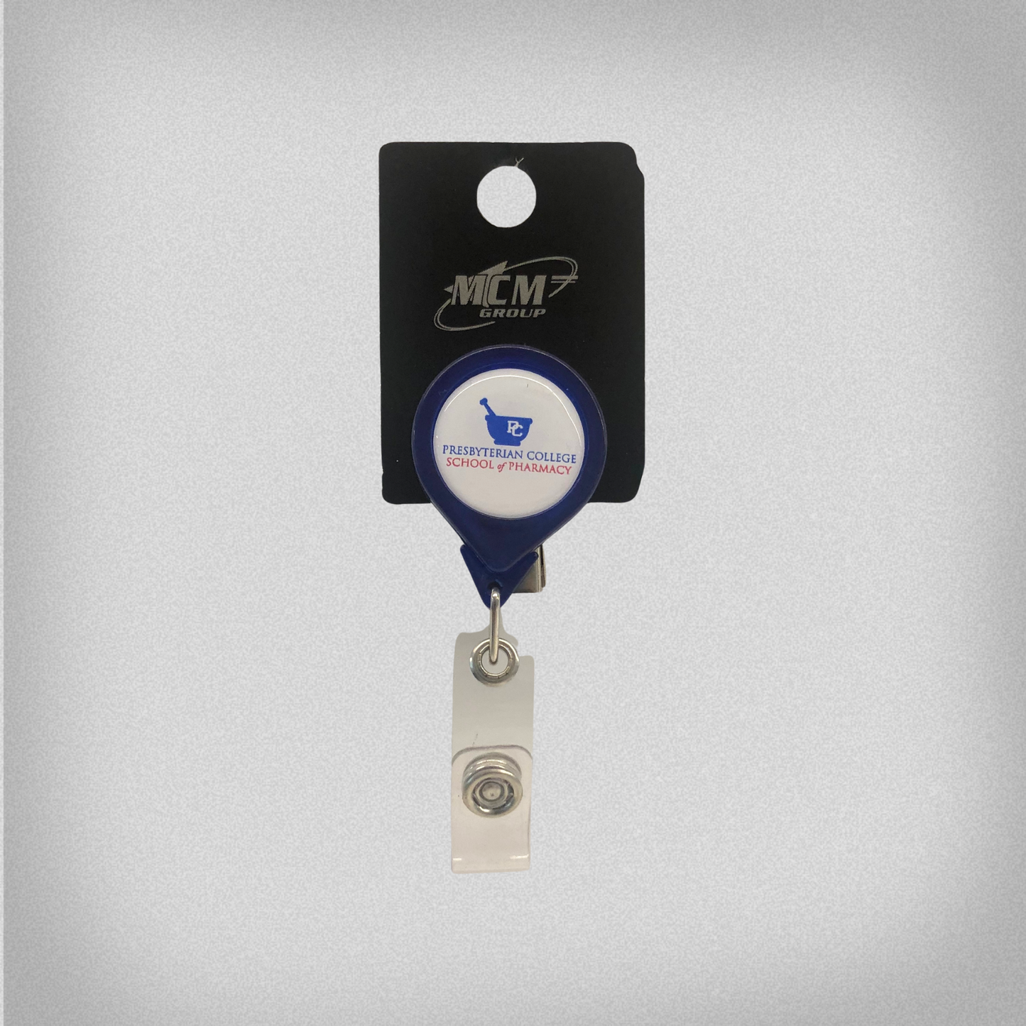 Product photo of a retractable lanyard branded with the Presbyterian College School of Pharmacy logo on a white background.