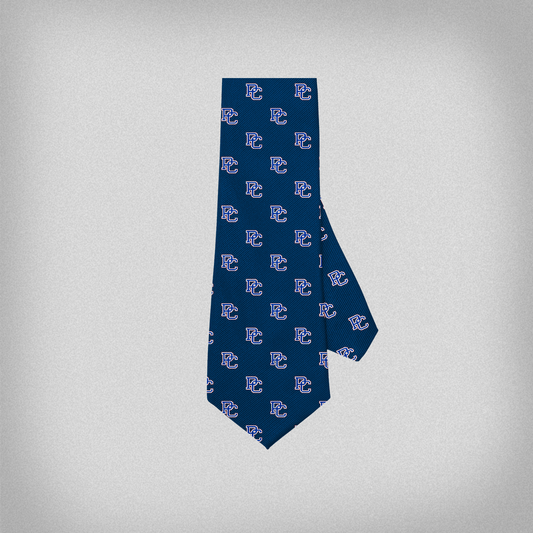 A navy blue necktie with a pattern of block PC logo repeated multiple times.