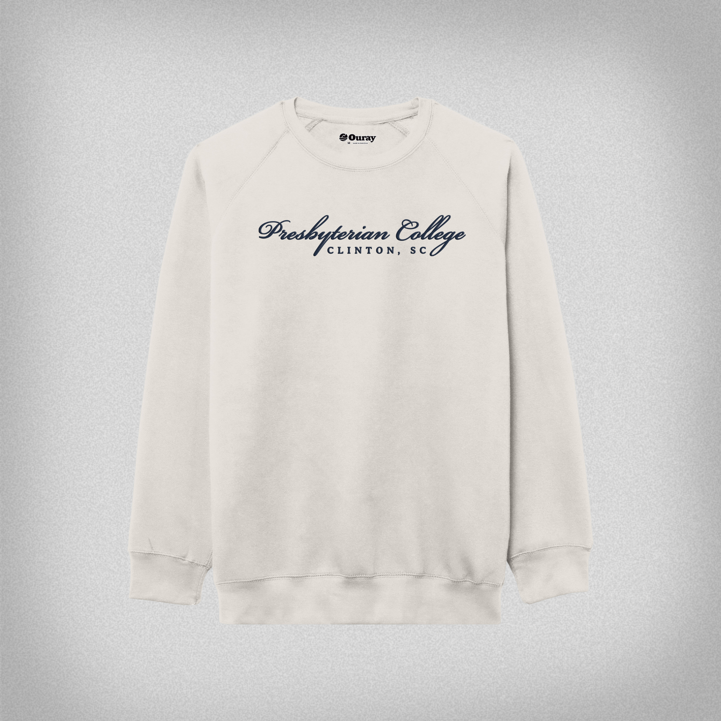 oatmeal sweatshirt with Presbyterian College Clinton, SC embroidered in navy thread