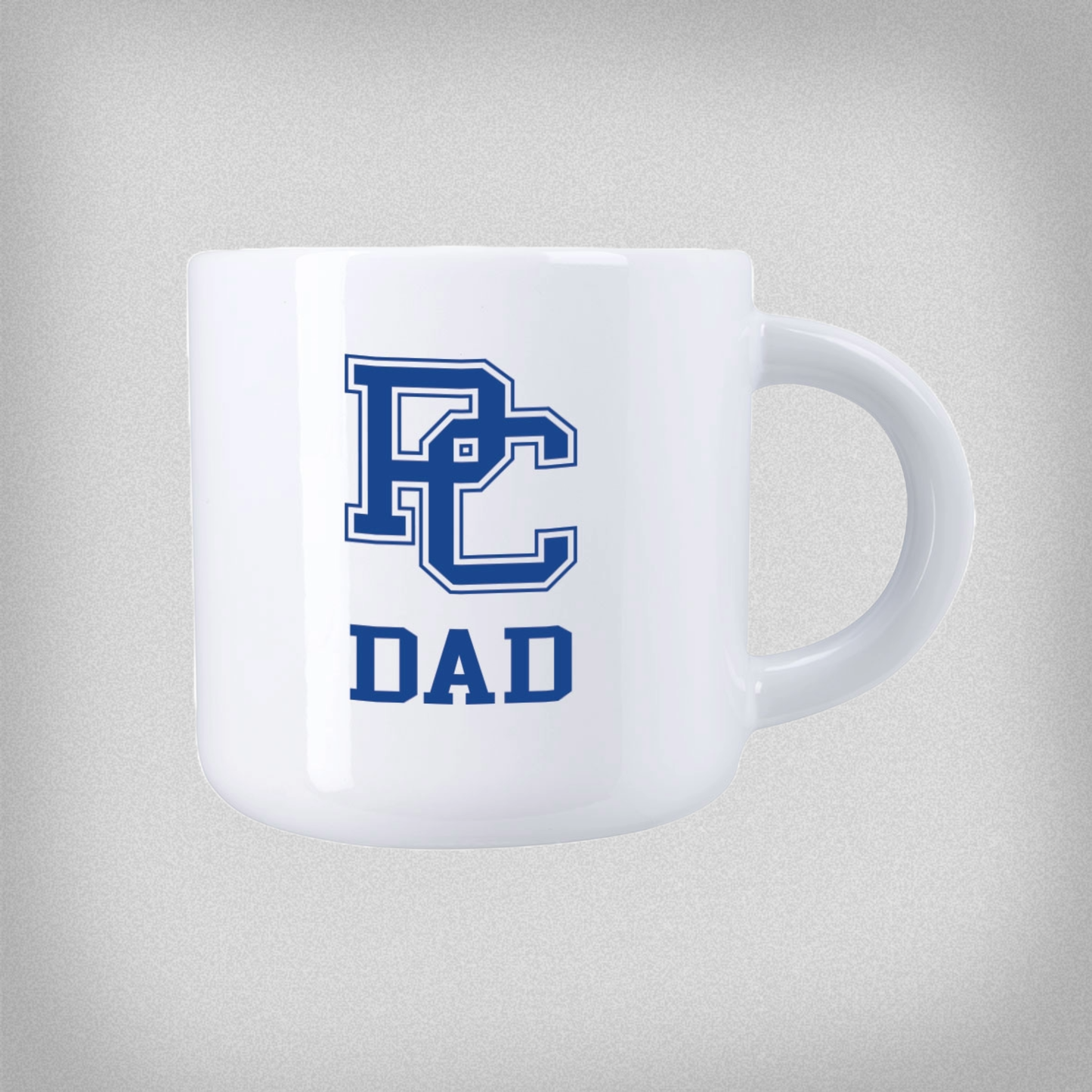 White mug with blue 'PC' logo and 'DAD' text on a light gray background