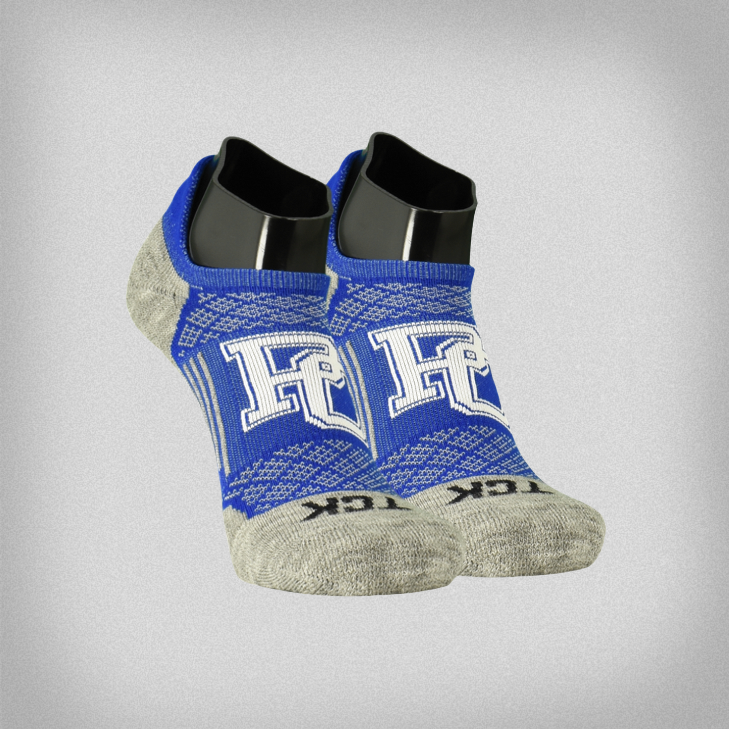 Blue and gray socks with 'PC' logo on front