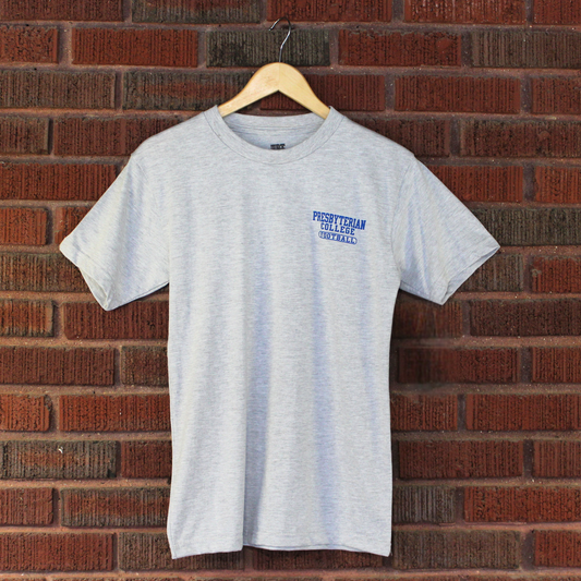Product photo of the front of a light grey t-shirt that has Presbyterian Colleg Football in blue ink printed on the left front chest.