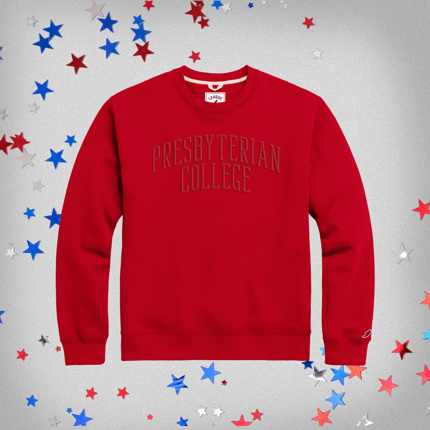Red crewneck sweatshirt with Presbyterian College embroidered in red thread across the front in a slight arch.