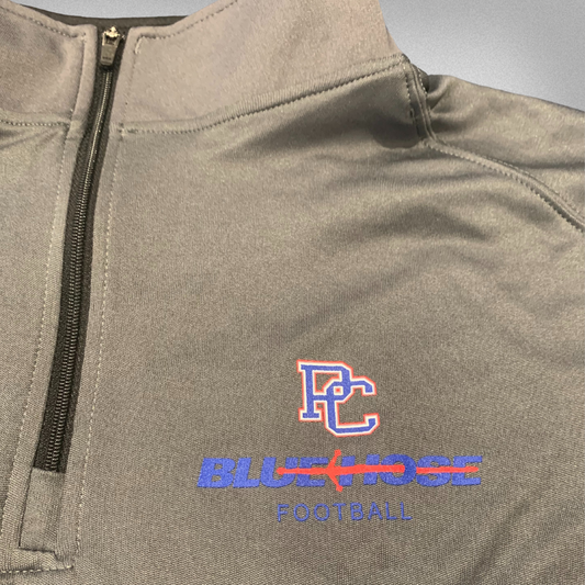 detail photo of the screen printed graphic on the left front chest that includes a block PC logo above the Blue Hose athletic wordmark with Football printed below it.