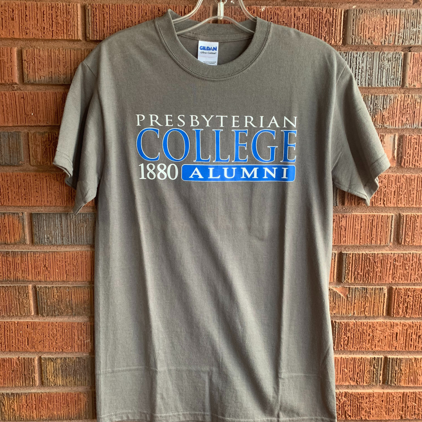 Grey t-shirt with a white and blue graphic that says "Presbyterian College Alumni 1880".
