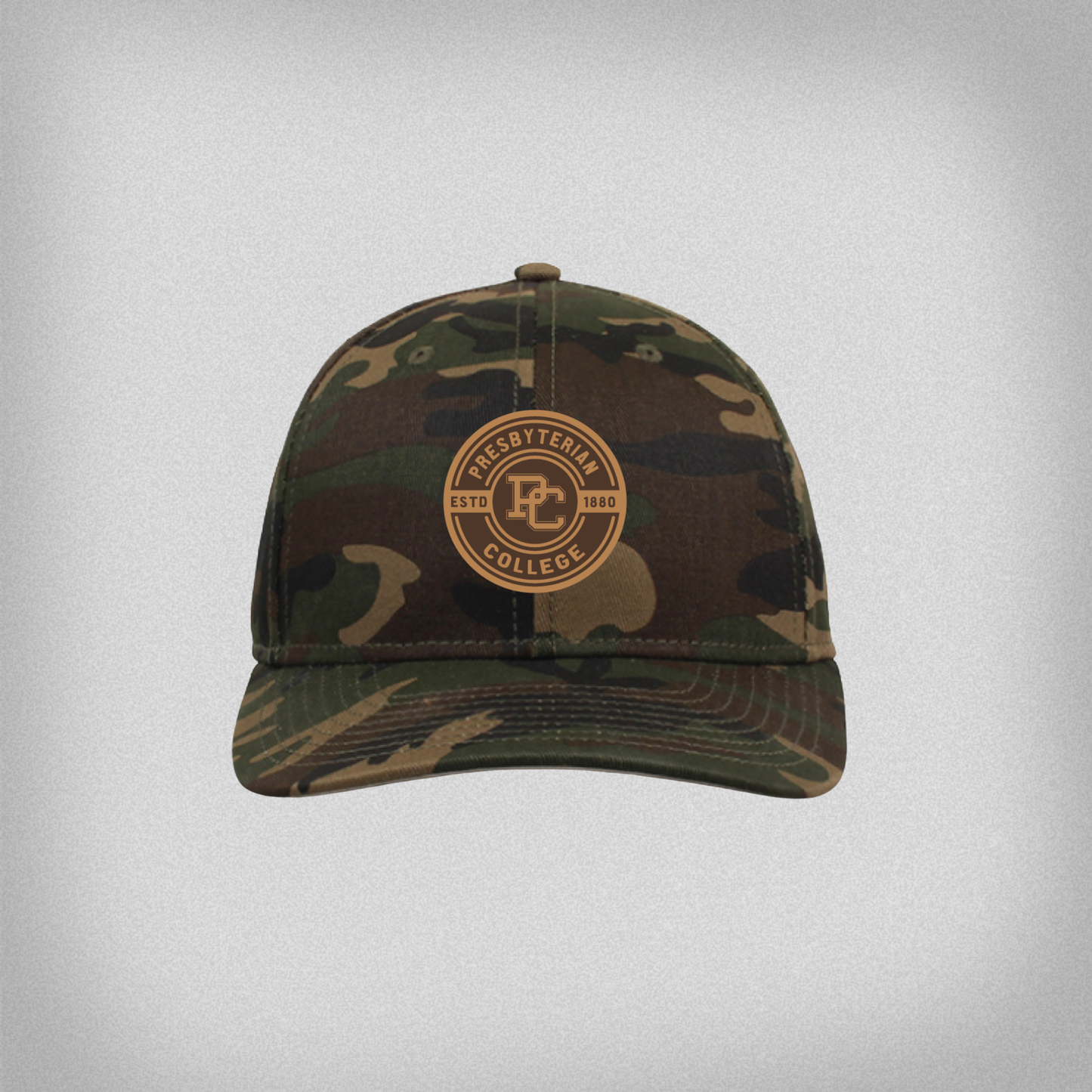 Camouflage baseball cap with 'Presbyterian College Estd 1880' and the block PC logo on a circular lego patch on the front.