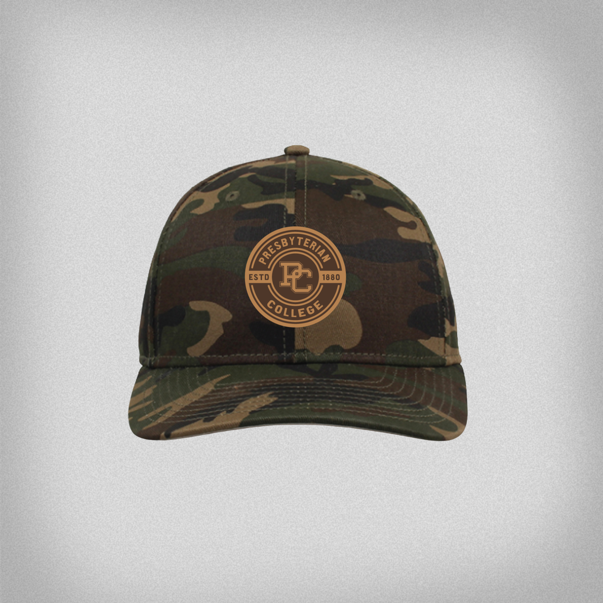 Camouflage baseball cap with 'Presbyterian College Estd 1880' and the block PC logo on a circular lego patch on the front.