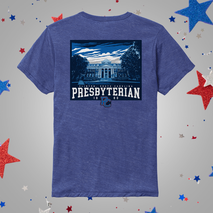 A heathered blue short-sleeve t-shirt shown from the back, featuring a large graphic print of a classical building with the text 'PRESBYTERIAN 1868' and a small blue 'PC' logo. The shirt is displayed on a light gray background decorated with scattered red, white, and blue glitter stars.