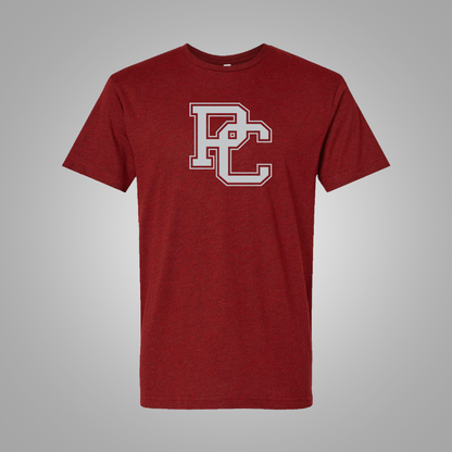 A garnet short-sleeve t-shirt with a light  gray collegiate-style 'PC' logo on the chest, displayed against a neutral gray background.
