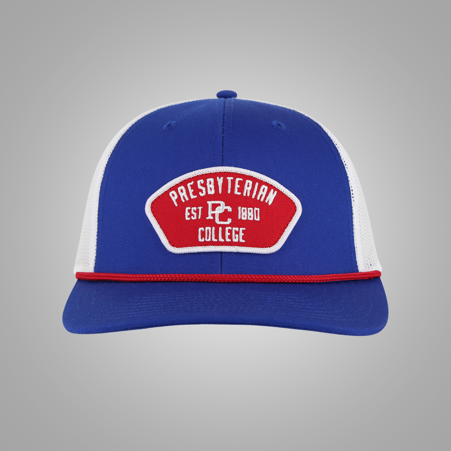 A royal blue and white trucker-style baseball cap with a red and white embroidered patch on the front reading 'Presbyterian Est PC 1880 College'.
