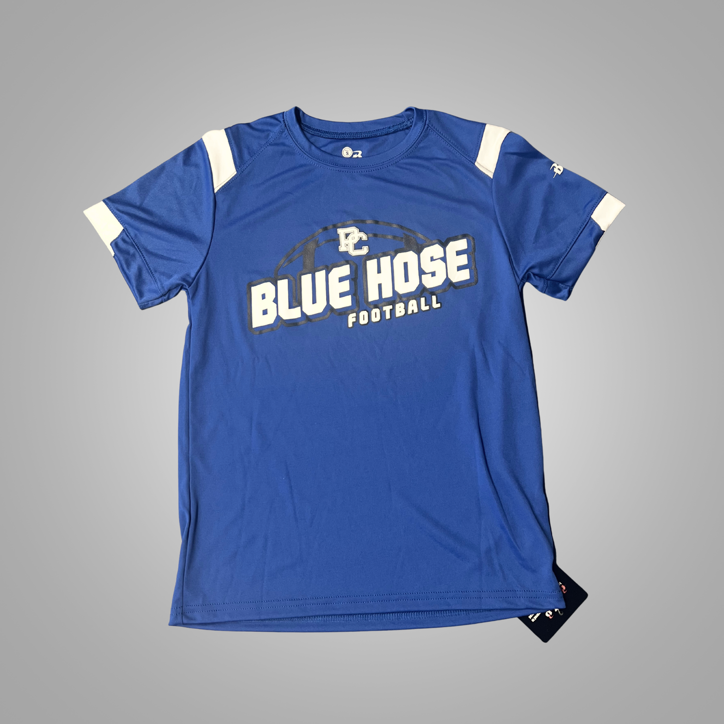 A royal blue short-sleeve athletic t-shirt with white shoulder panels and white sleeve cuffs, featuring a 'BLUE HOSE FOOTBALL' graphic on the chest. The shirt is displayed flat against a neutral gray background with a hangtag attached.
