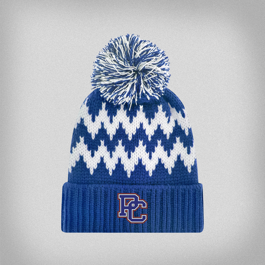 Blue and white patterned knit beanie with an embroidered PC logo on the cuff and with a pom-pom on top