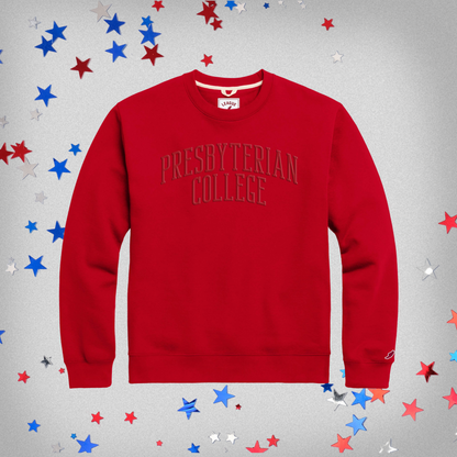 Red crewneck sweatshirt with Presbyterian College embroidered in red thread across the front in a slight arch.