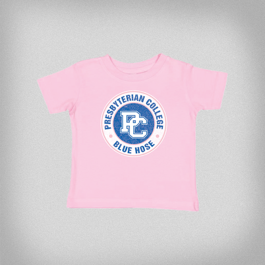 Product photo of a pink toddler t-shirt with a distressed blue and white Presbyterian College design. 