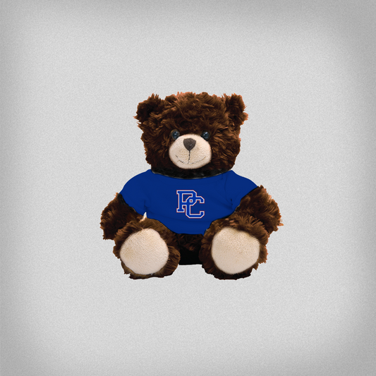 Brown teddy bear with a royal blue t-shirt with the block PC logo on it!