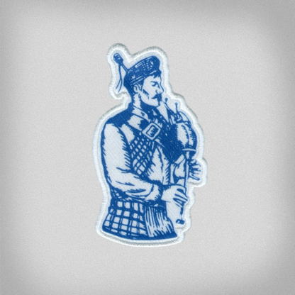 Blue and white patch of the Presbyterian College Bagpiper Scotsman