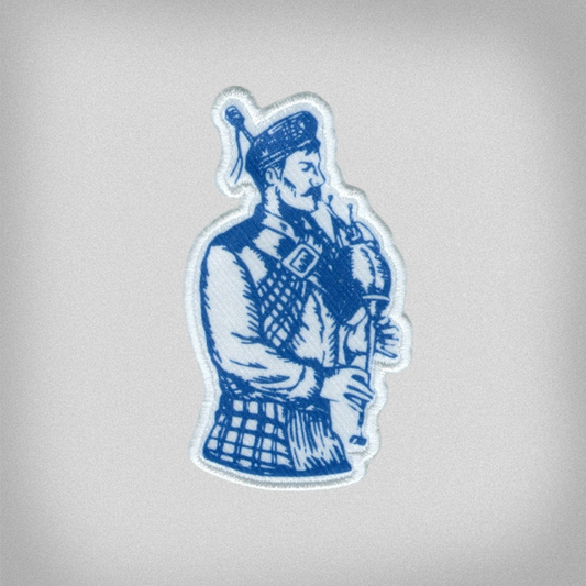 Blue and white patch of the Presbyterian College Bagpiper Scotsman