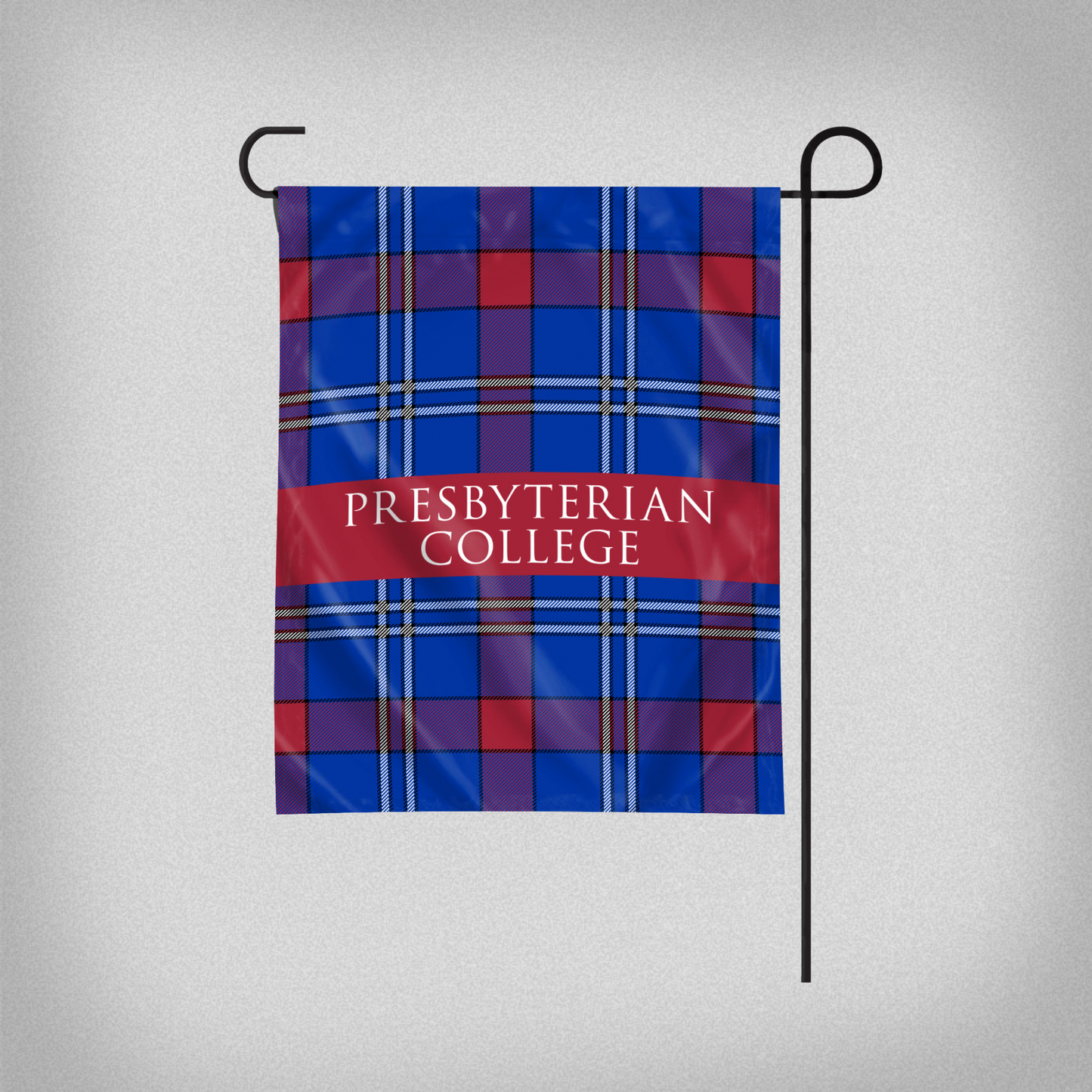 blue, white, and red tartan garden flag with Presbyterian College across the middle.