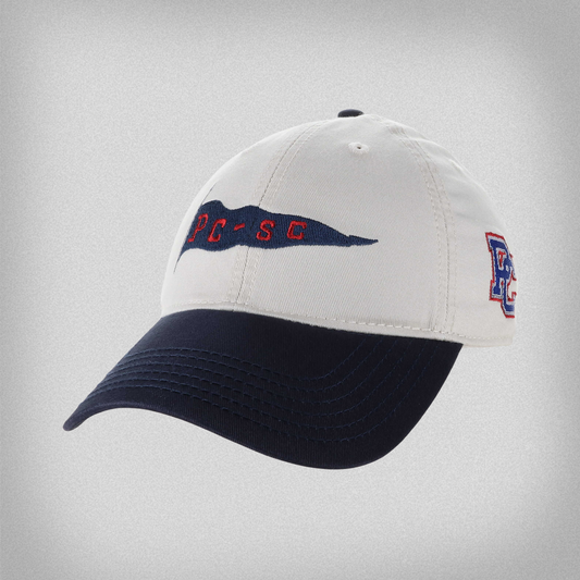 Khaki and navy cap with embroidered vintage PC-SC flag on the front and a block PC logo on the side pictured on a light gray background