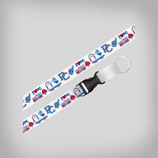 white lanyard with blue, red, and white designs that include the block PC, south carolina, Neville Hall, the bell, and the PC sign