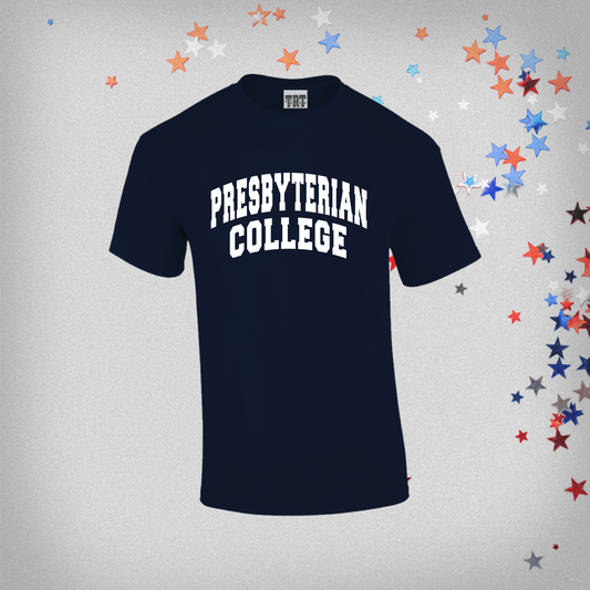 navy blue t-shirt with presbyterian college in white ink in an arch across the chest. Product photo has red white and blue stars in the background.