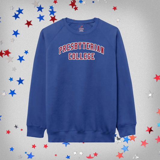 Royal blue sweatshirt with applique Presbyterian college in red and white on it. Background of the product photo has red white and blue stars on it